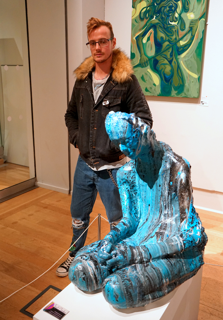 Award winner Jay Clarke with his sculpture
