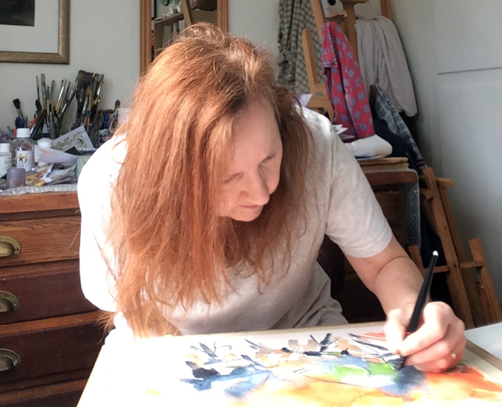 Maxine Dodd painting in her studio