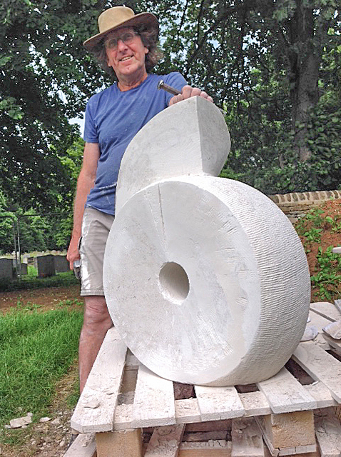 Photograph of Michael Moralee with sculpture