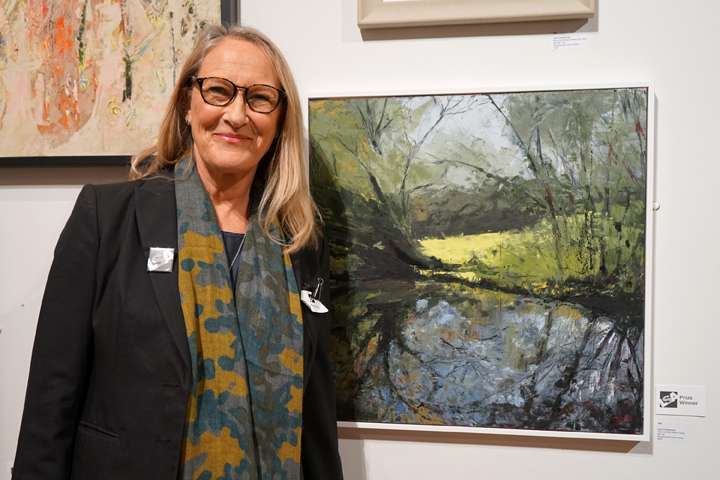 Lisa Timmerman with her winning oil painting