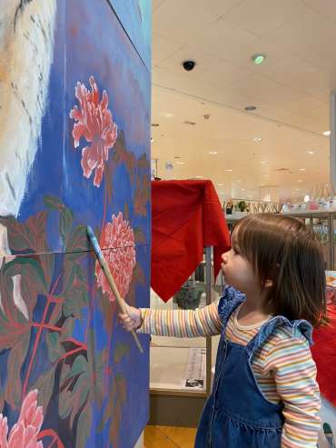Thumbnail image of Siyuan is given a helping hand by a budding artist - Happy Spring Festival with John Lewis and The Peony Girl