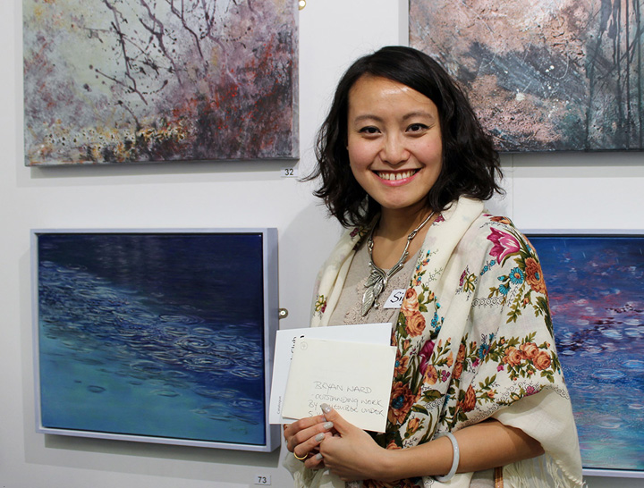 Siyuan Ren with her painting