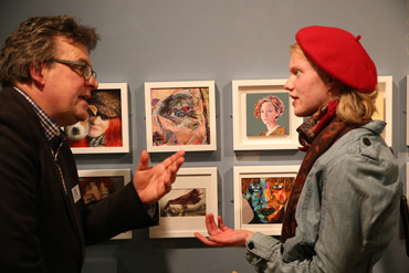 Thumbnail image of Lars Tharp with Becky Hayley (Oakham School student) in front of her prizewinning painting 'The Red Scarf' - Little Selves - Preview Photographs