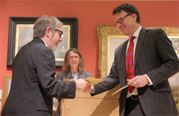 Thumbnail image of Chris Hailes presenting the&nbsp;prize to Charles Stanley Silver Prize winner&nbsp;Dave Pigeon - LSA Annual Exhibition 2017 Preview Evening