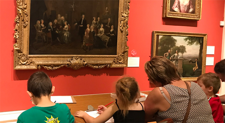 visitors drawing the Hogarth at New Walk Museum